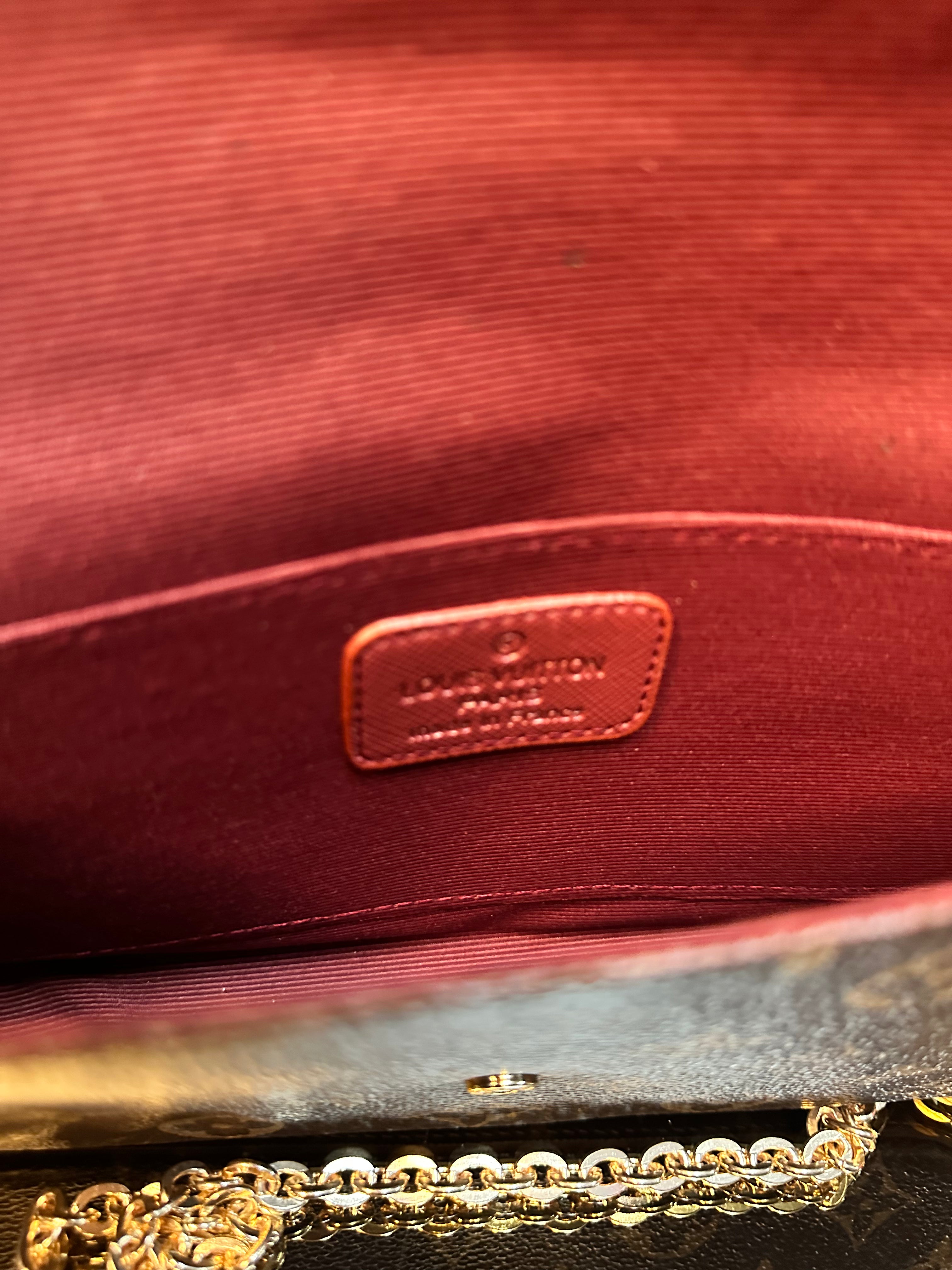 Louis Vuitton Felluci bag